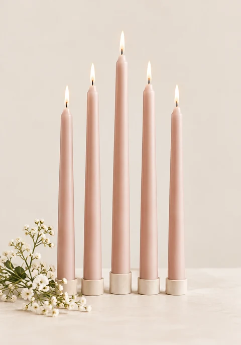 Category inspiration: Blush taper candles with small ivory flowers